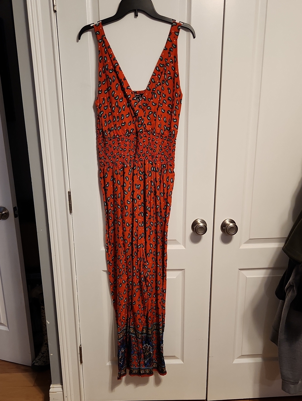 Sleeveless Orange Printed Jumpsuit with Smocked Waist